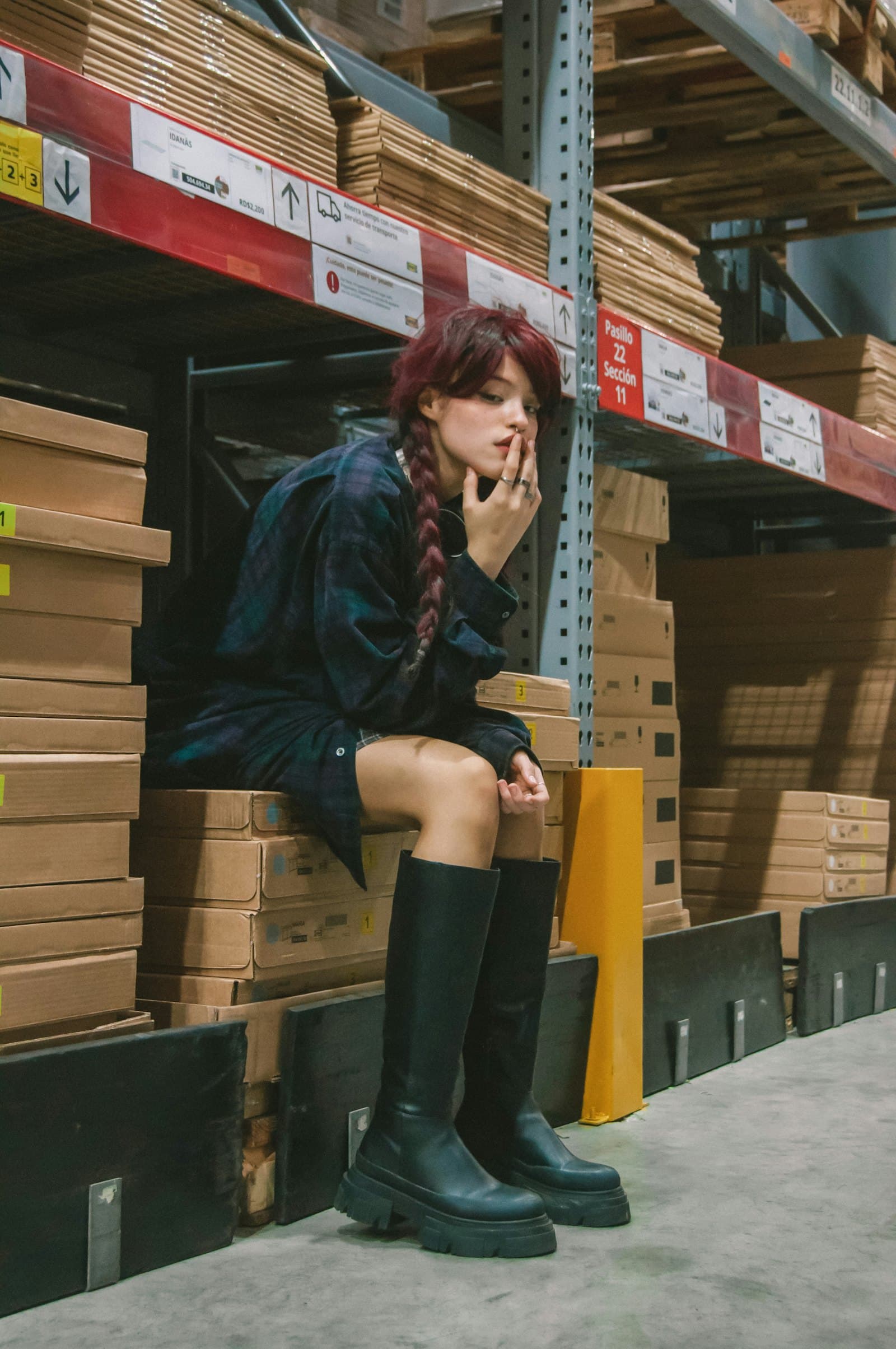 Warehouse operative using a phone